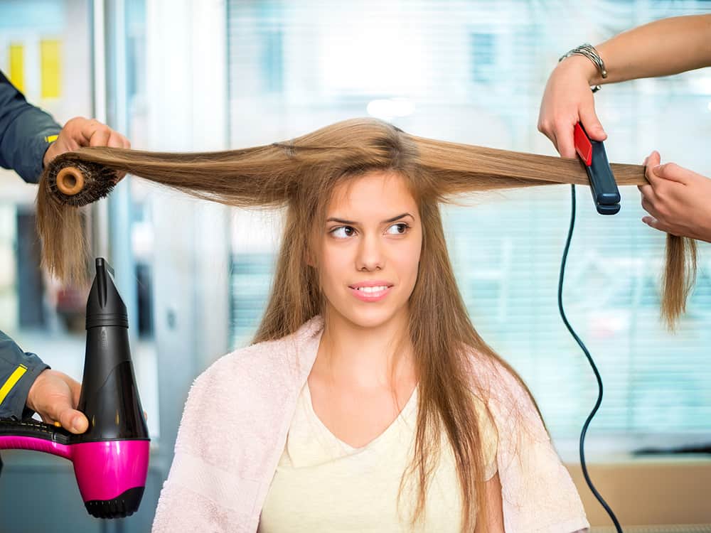 salon barbers blow, curl and straighten a girl's hair